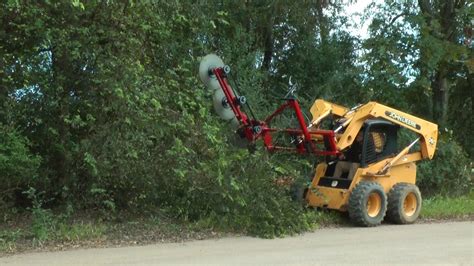 trailblazer tree trimmer for skid steer|skid steer tree trimmer attachment.